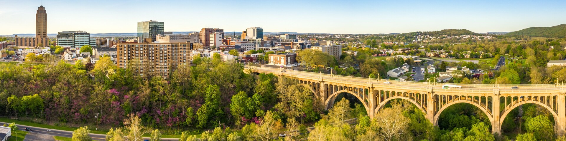 Aerial panorama of Allentown, Pennsylvania skyline and Albertus L. Meyers Bridge (aka Eighth Street Bridge) on late sunny afternoon . Allentown is Pennsylvania's third most populous city.