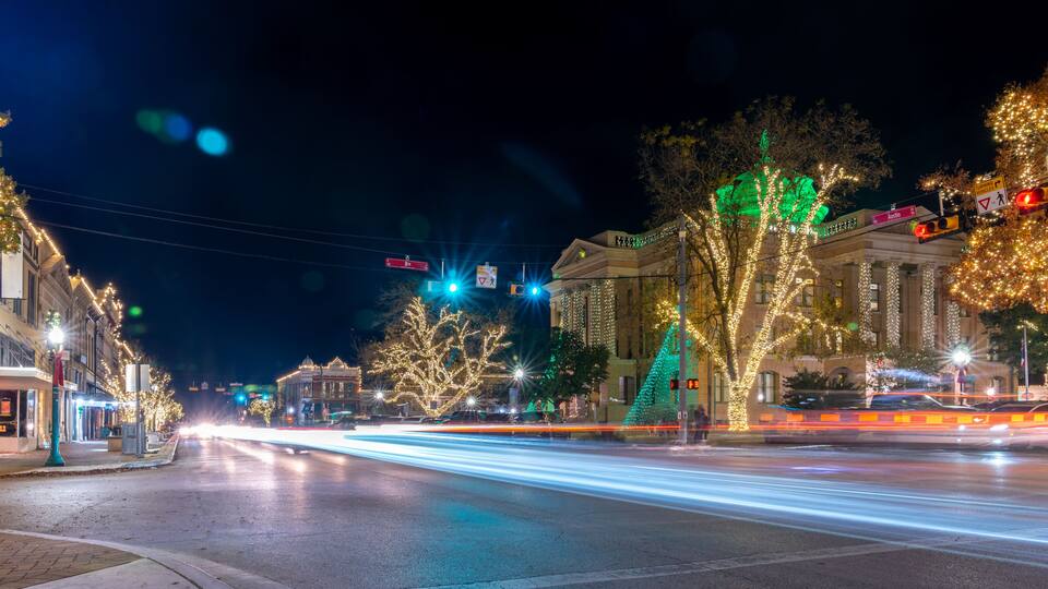 Panoramic Picture of the Main Downtown Street With the Georgetown Square Lit up and decorated for the Holidays