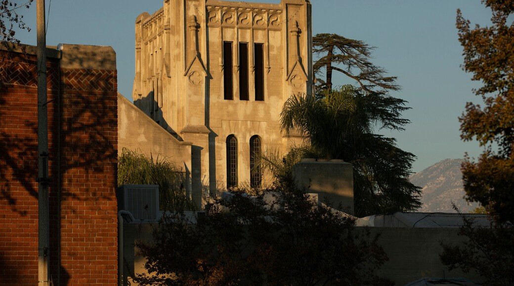 Sunset light shines on historic buildings in downtown La Verne, California, USA.