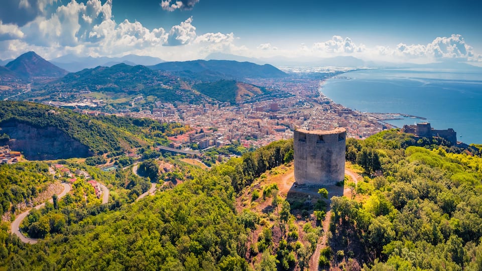 Astonishing summer view from flying drone of Bastiglia tower and Arechi Castle. Spectacular morning cityscape of Salerno town, Italy, Europe. Traveling concept background.