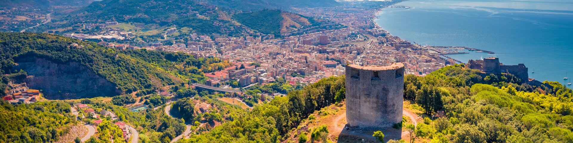 Astonishing summer view from flying drone of Bastiglia tower and Arechi Castle. Spectacular morning cityscape of Salerno town, Italy, Europe. Traveling concept background.
