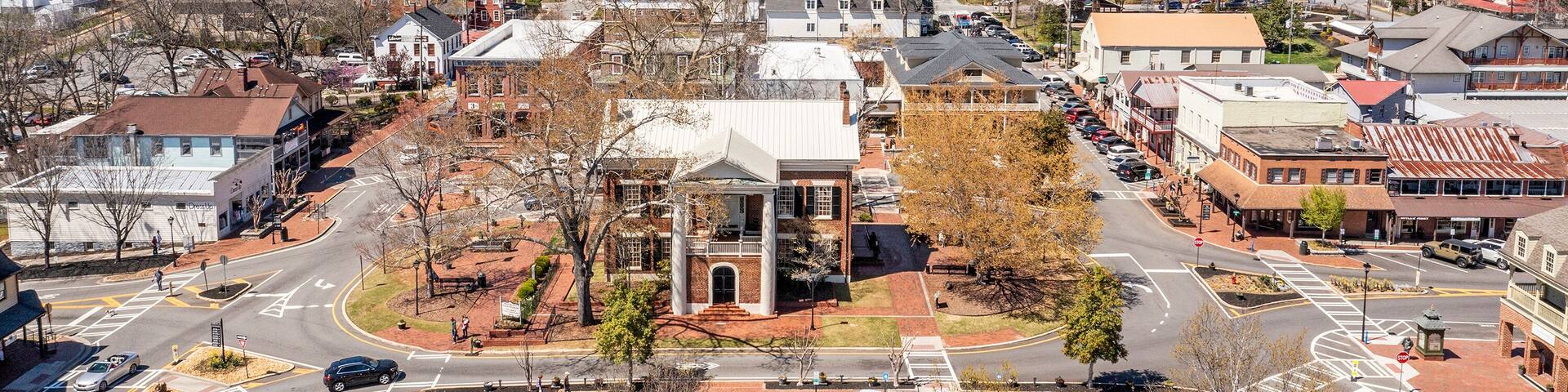 Aerial Photo of city center of small Georgia Mountain Town with Blue Ridge Mountains in the background