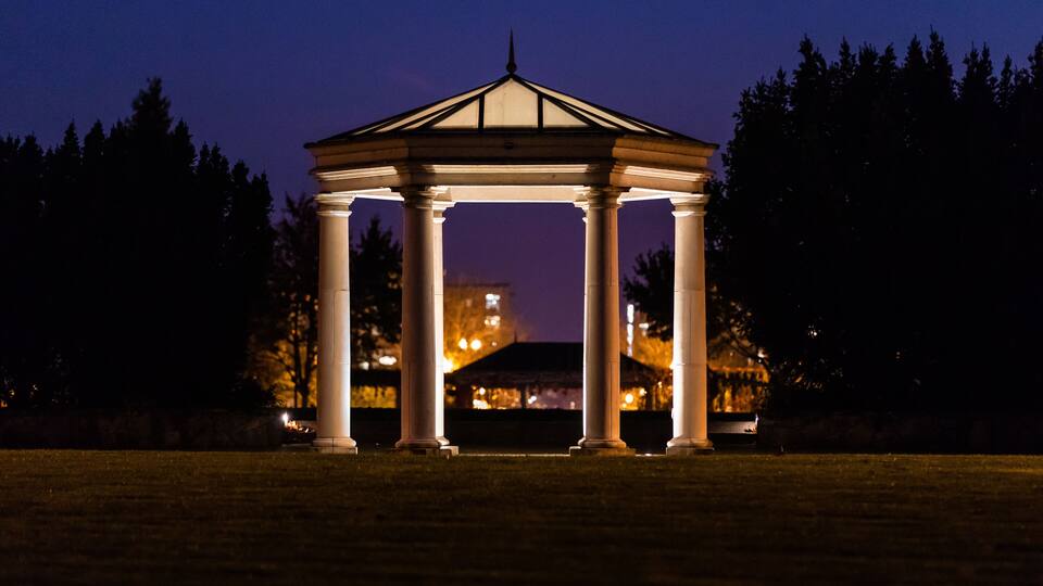 View at an illuminated gazebo in a a Central Park of Hillsboro