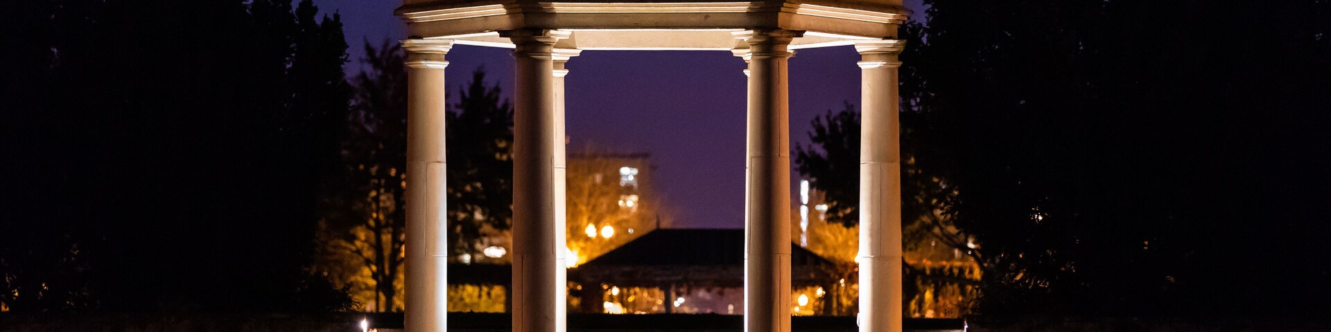View at an illuminated gazebo in a a Central Park of Hillsboro