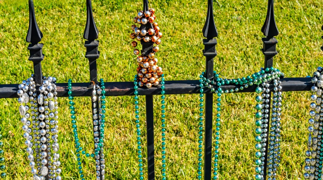 Colorful white, green glass beads, Garden District, New Orleans, Louisiana. Beads handed out at Mardi Gras.