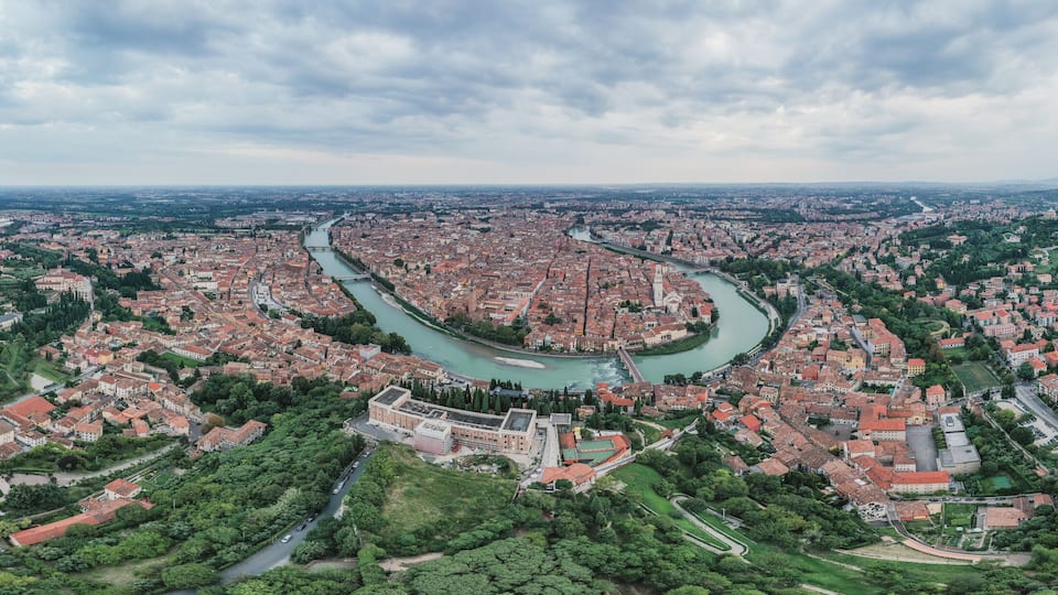 Aerial panarama drone shot of Verona medieval city from Castel Pietro