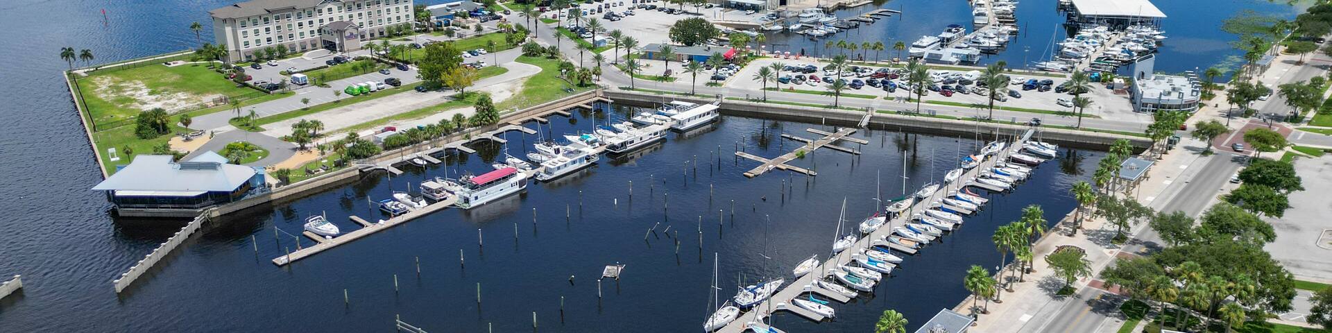 Boats docked in marina harbor on Lake Monroe near downtown Sanford north of Orlando, Florida.