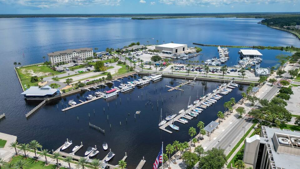 Boats docked in marina harbor on Lake Monroe near downtown Sanford north of Orlando, Florida.