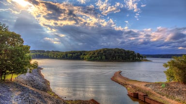 Majestic Clouds over Lake Wappapello Redman Creek Recreational Area The sun peaks out of some storm clouds over Lake Wappapello, creating some
