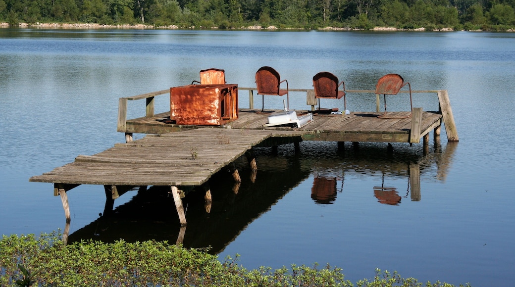 Old Dock with Rusty Chairs on Lake in Missouri