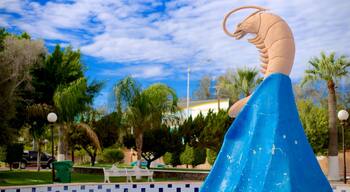 Puerto Penasco which includes street scenes, outdoor art and a park