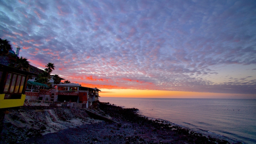 Mexico which includes a coastal town, a sunset and a bay or harbor