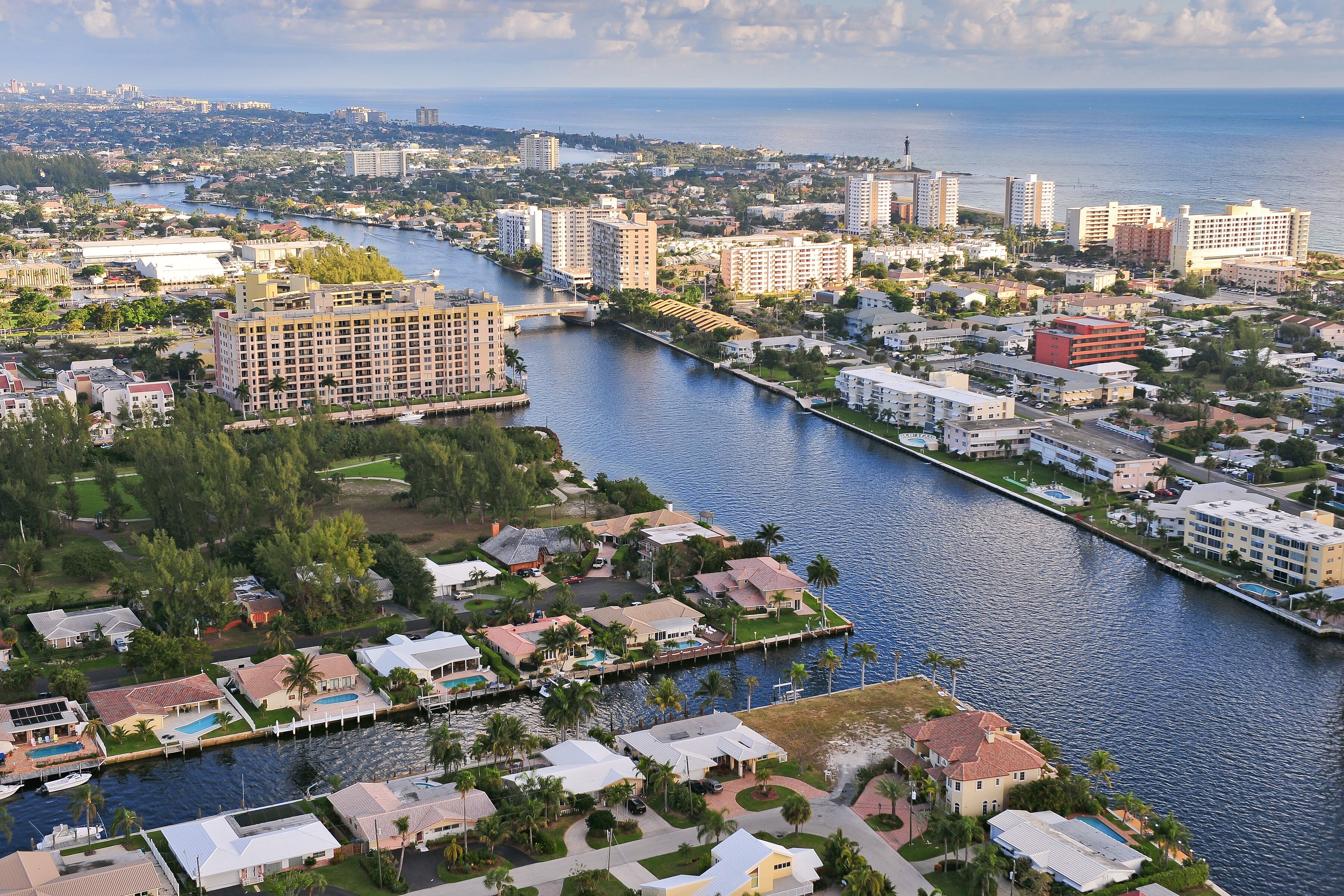 aerial view of atlantic intracoastal waterway and ocean at pompano beach florida, with hillsboro inlet and lighthouse