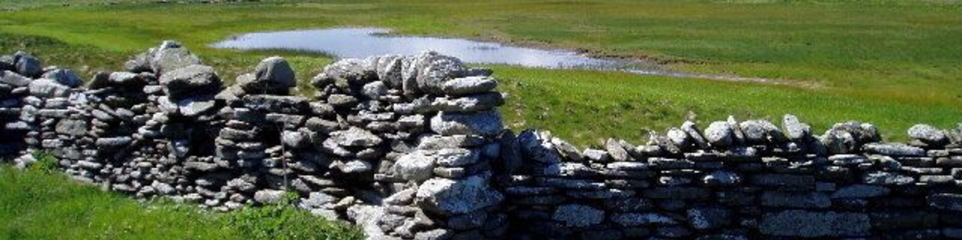 Loch of Ness. The Loch of Ness and the bay of North Wick beyond, on Papay (Papa Westray), Orkney.