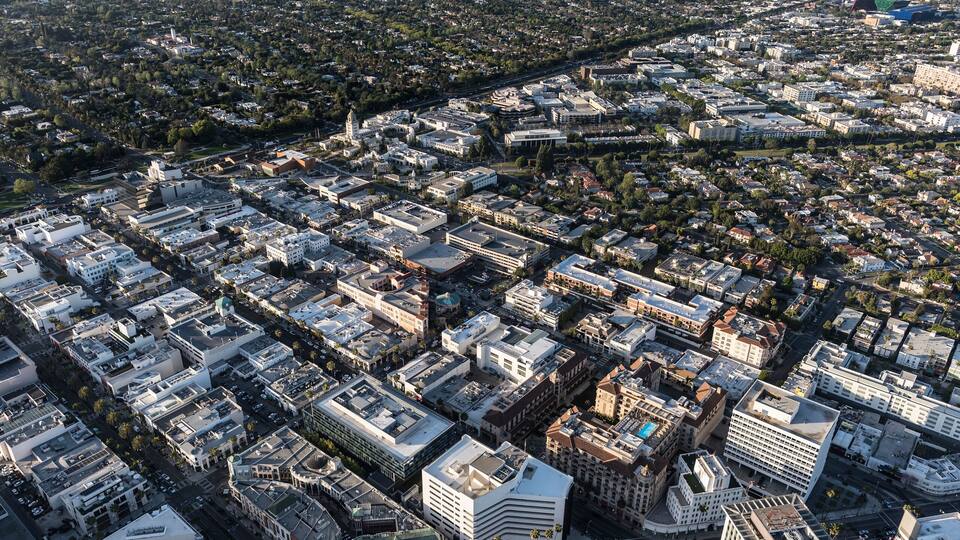 Aerial view of the downtown shopping district near Wilshire Blvd and Rodeo Dr in scenic Beverly Hills, California.