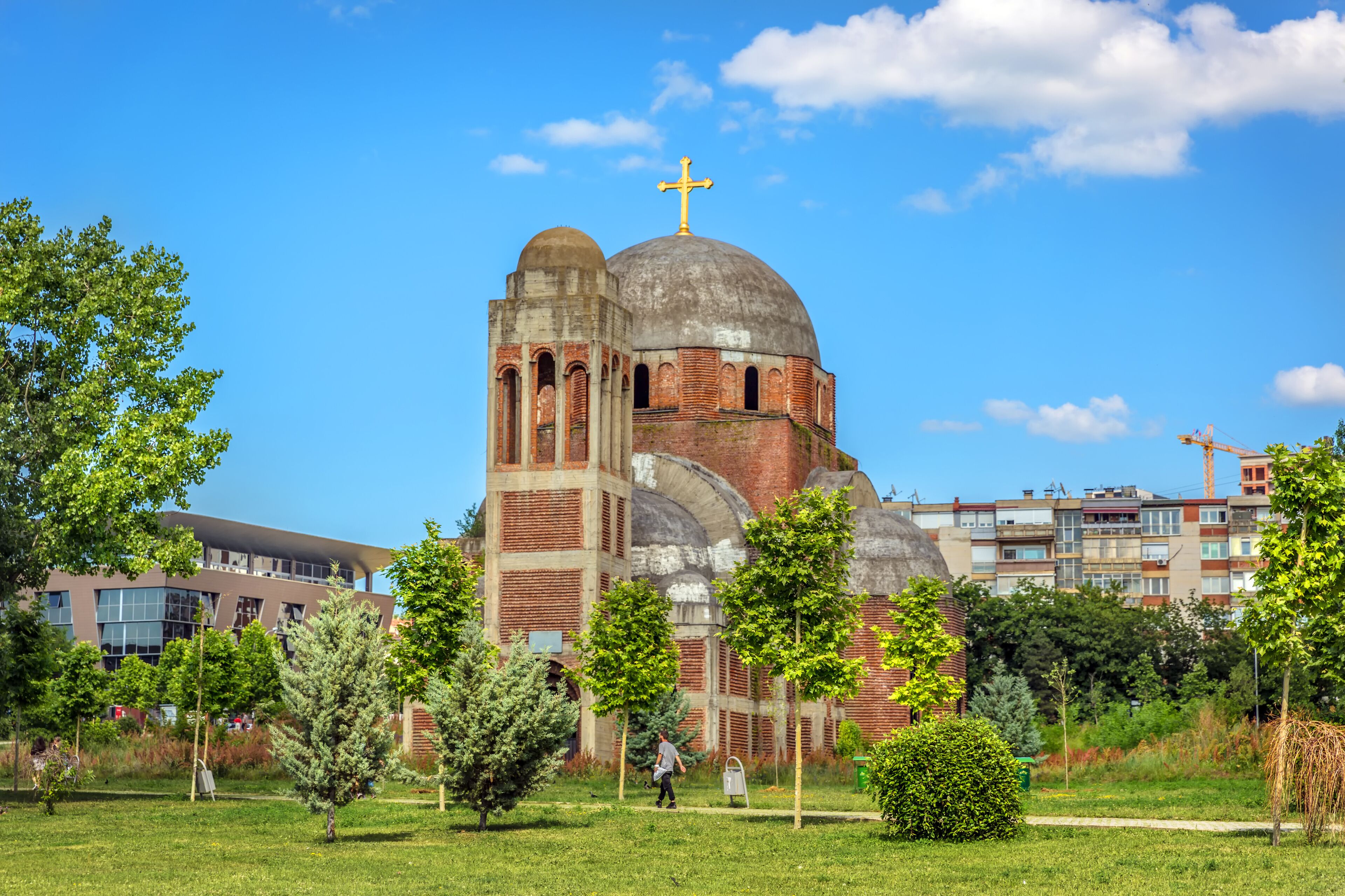 Pristina, Kosovo - May 30th 2018 - A huge orthodox church in a open grass field in Kosovo
