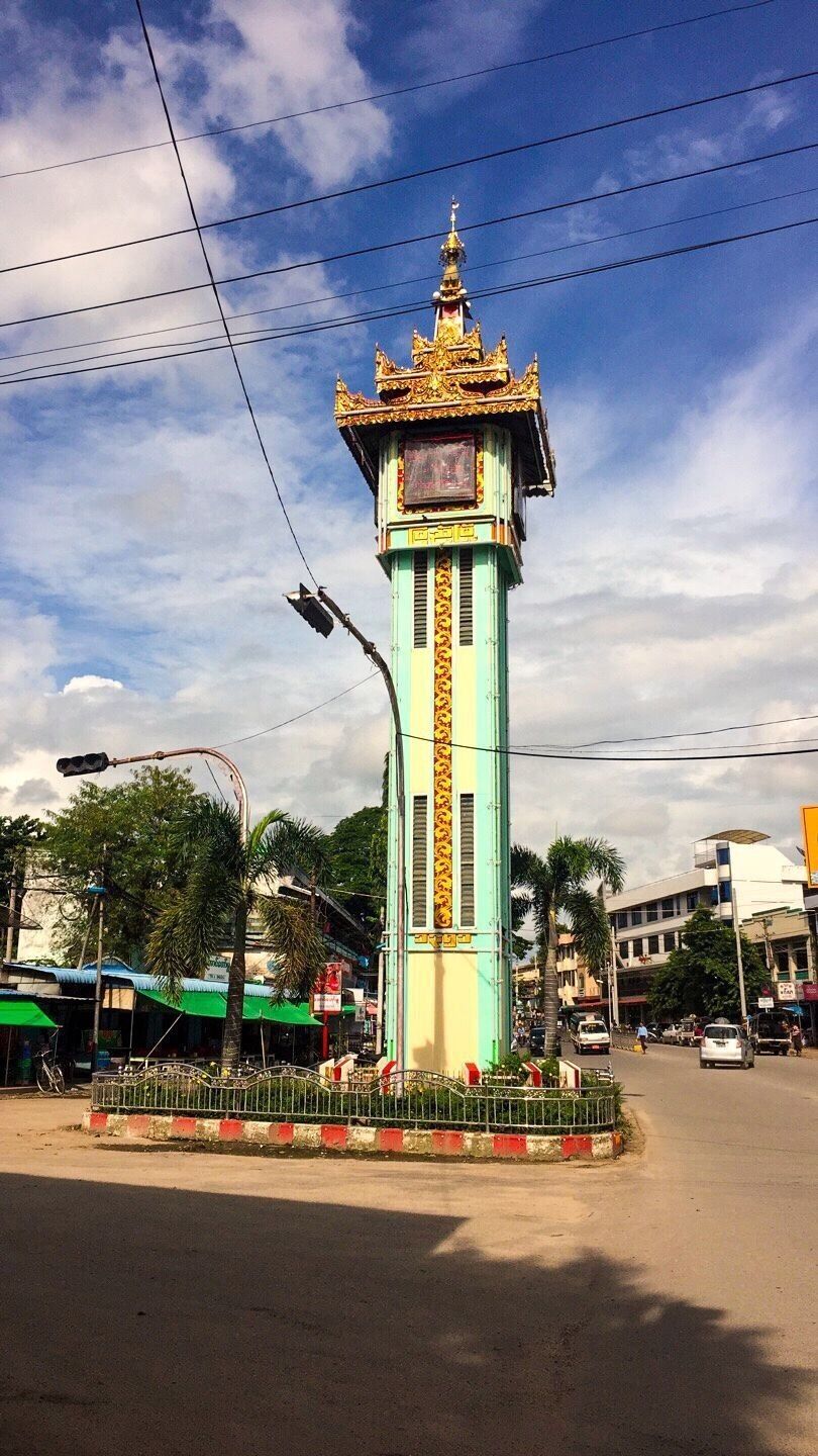 The clock tower at the front of Shwe San Daw Pagoda , the view as the street photo . 