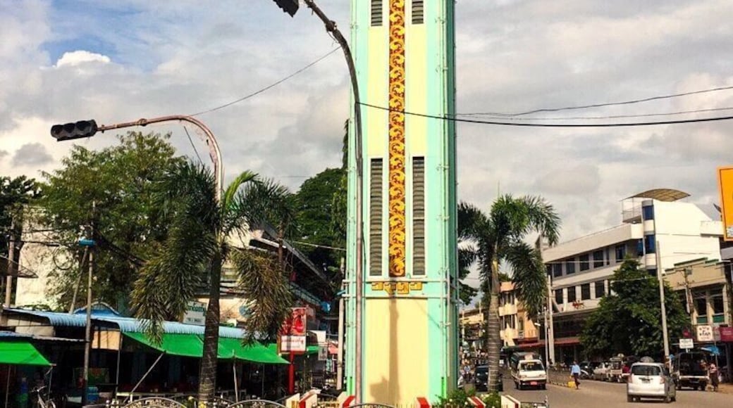 The clock tower at the front of Shwe San Daw Pagoda , the view as the street photo .