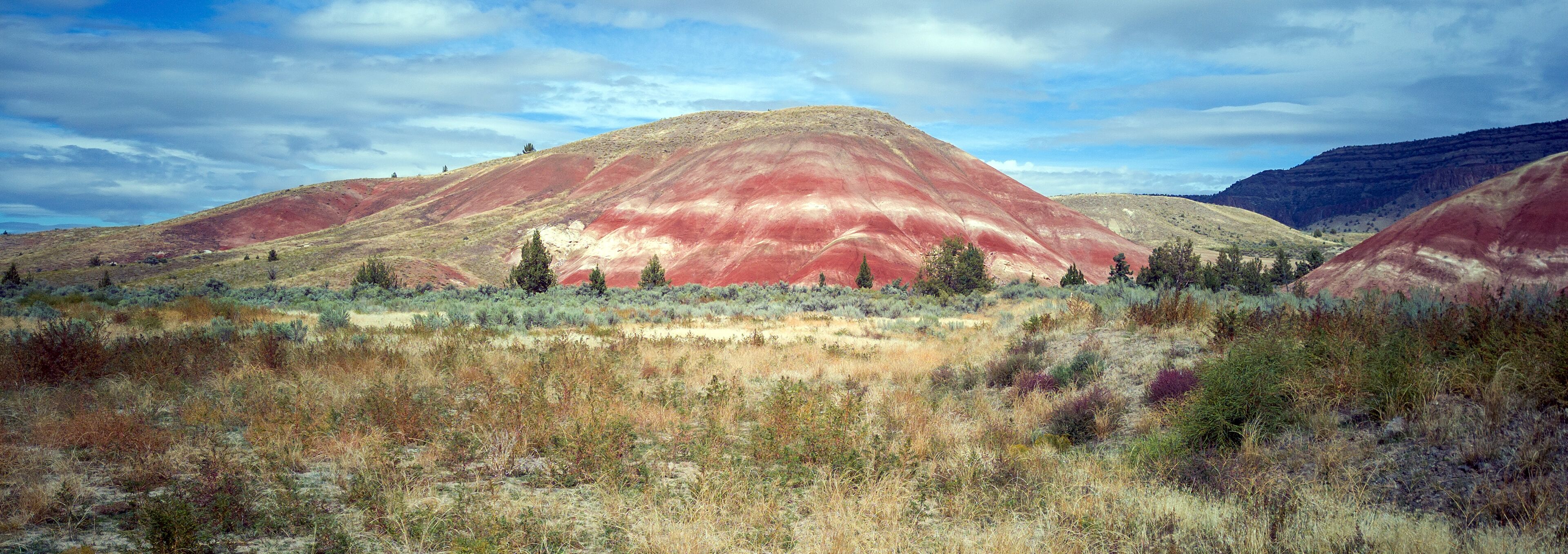 Panoramic stylish images of the Painted Hills Unit at the John Day Fossil Beds. Listed as one of the seven wonders of Oregon. Located outside the rustic town of Mitchell in Wheeler County.