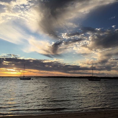 Carnarvon, north west Western Australia. Sun setting over inlet with dramatic cloud formation