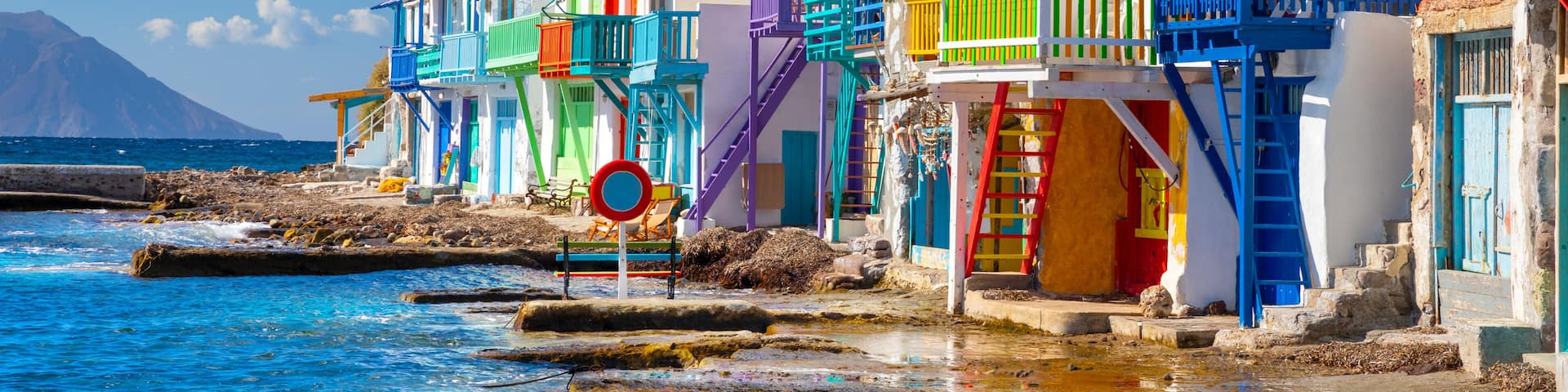 Vibrant fishing village of Klima with white houses and colorful doors on Milos Island in Greece