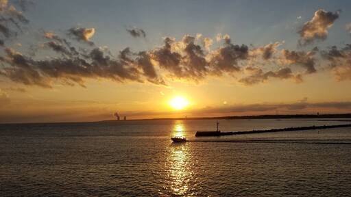 Every morning, when the weather is warm, just as the sun is rising, fishermen head out Lake Erie to fish for locally prized perch and walleye. This photo captures that morning ritual.