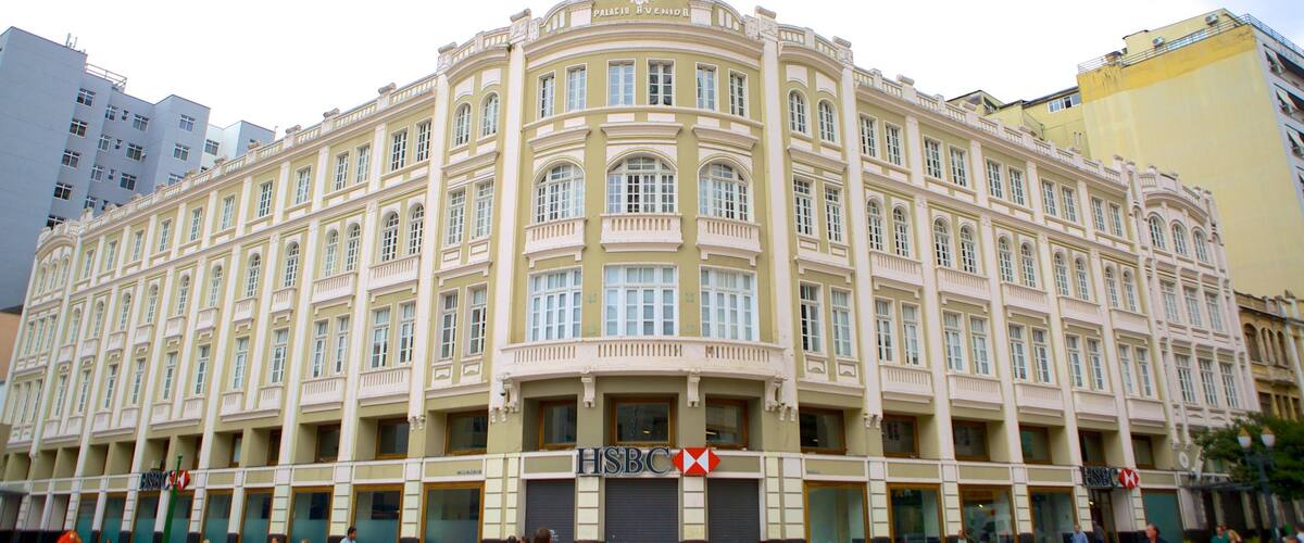 A historic building with ornate architecture, multiple windows, and a prominent HSBC sign.