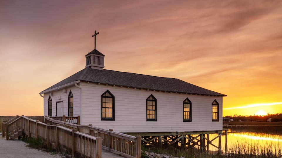 the historic Pawleys Island chapel on the salt marsh at sunset