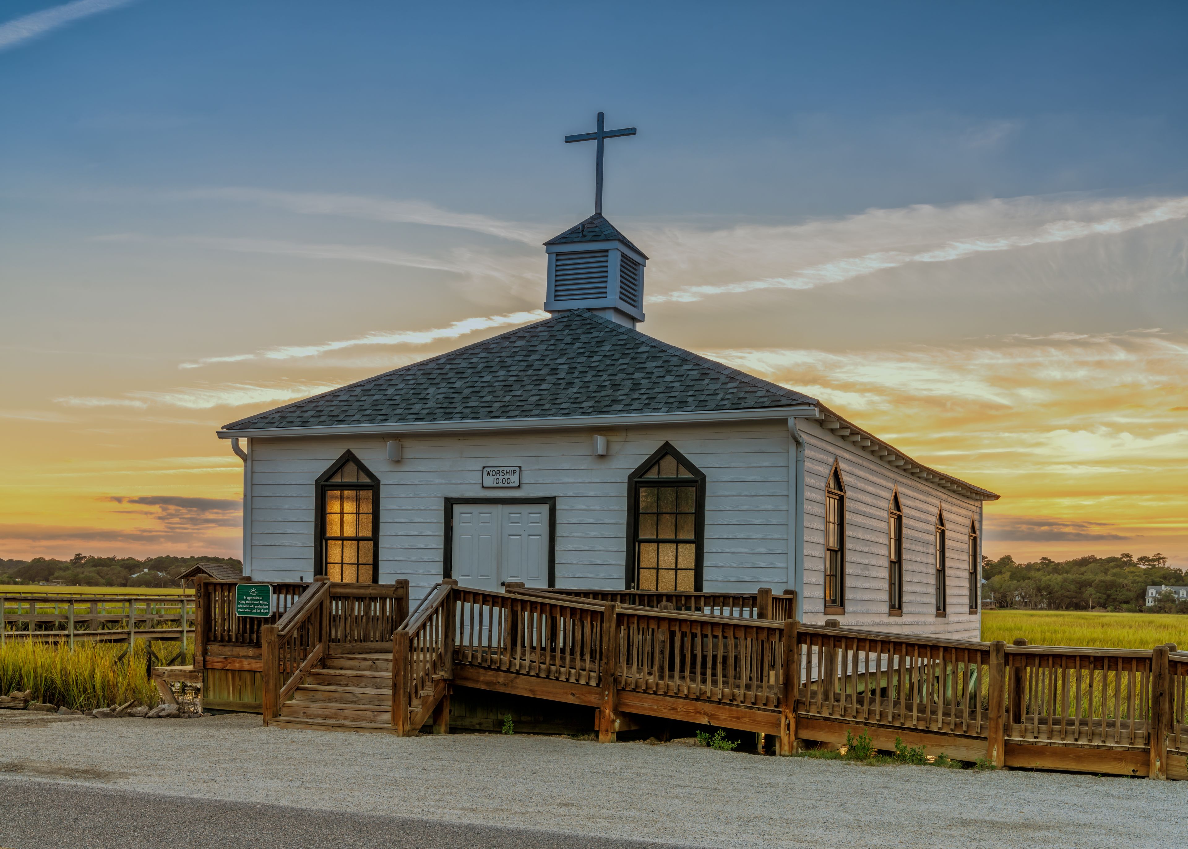historic Pawleys Island Chapel on the marsh at sunset
