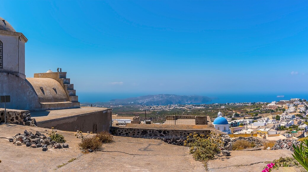 A panorama view across the castle ruins in Pyrgos, Santorini in summertime