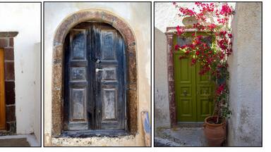 old doors of white houses on Santorini island, Greece