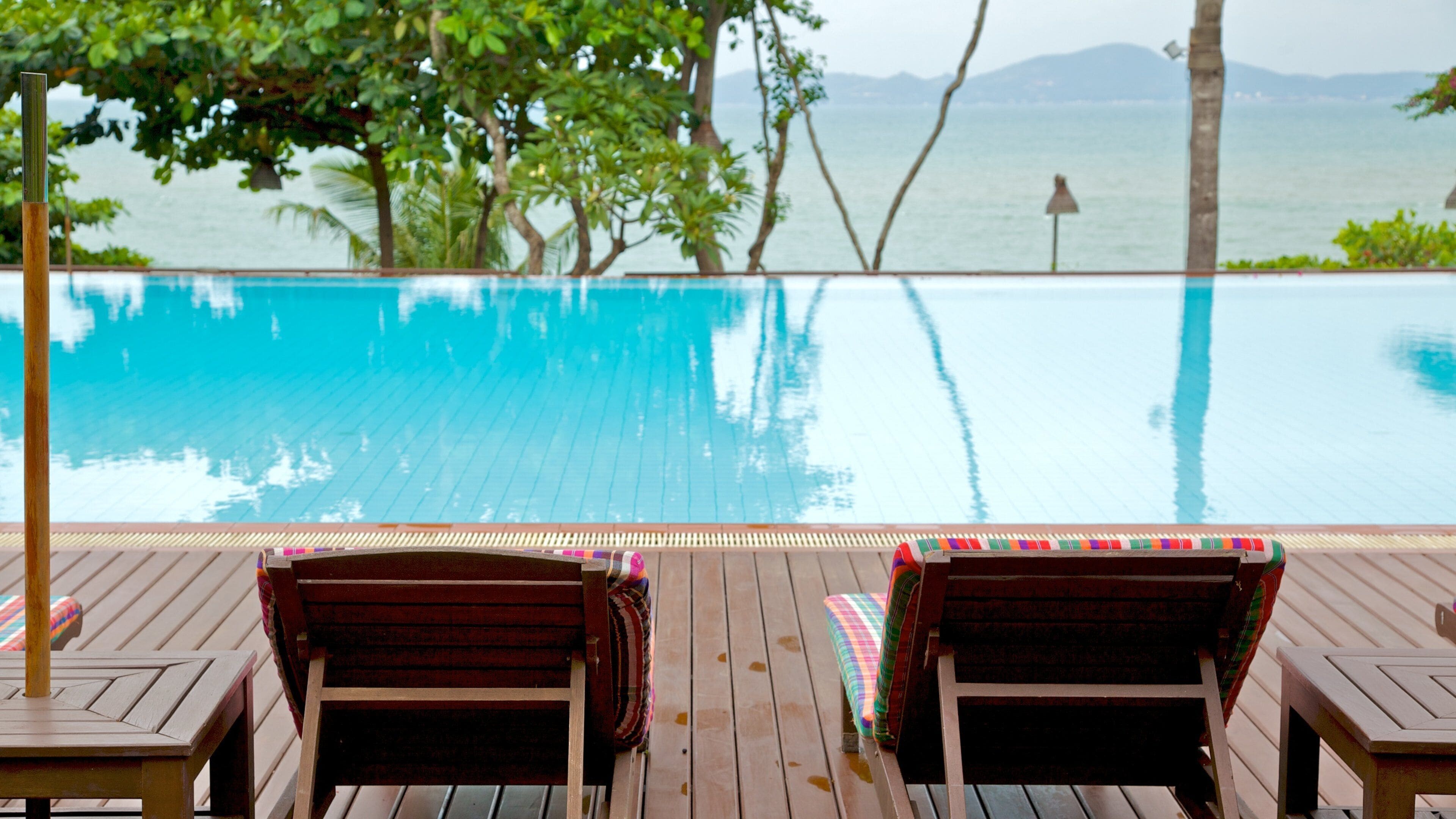 Pattaya showing general coastal views and a pool
