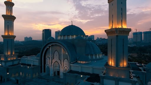 Aerial view of the Federal Territory Mosque, also known as Masjid Wilayah Persekutuan, during daytime in Kuala Lumpur - Malaysia