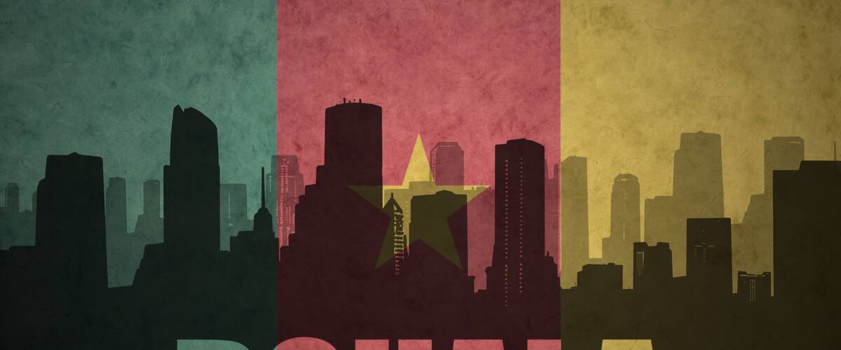 abstract silhouette of the city with text Douala at the vintage cameroon flag