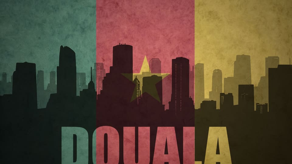 abstract silhouette of the city with text Douala at the vintage cameroon flag