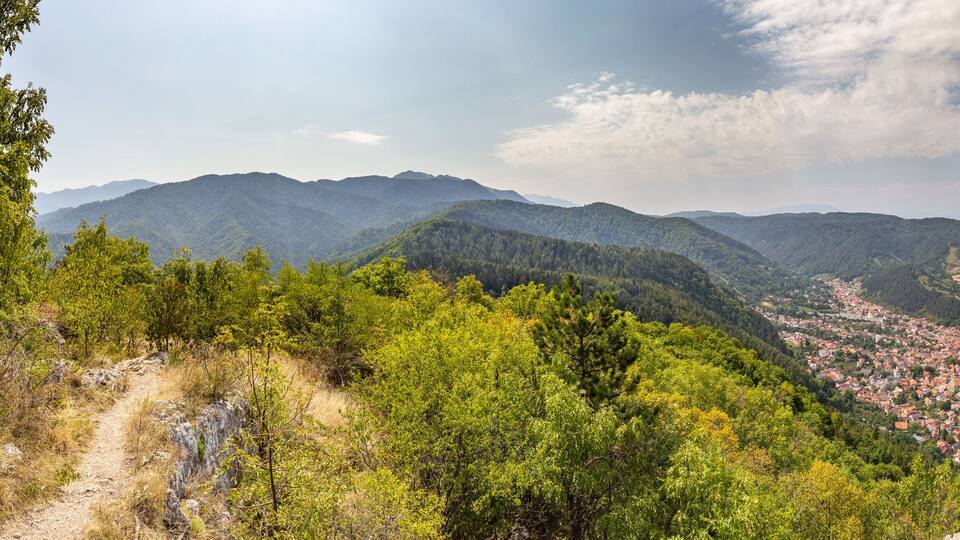 High Resolution Panoramic view of Scheii Brasovului neibourhood and Postavarul Peak shot from Tampa hill from a hiking trail, Brasov, Romania. 66 MPixels HDR