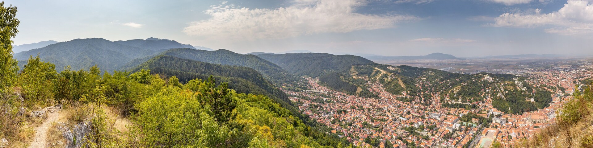 High Resolution Panoramic view of Scheii Brasovului neibourhood and Postavarul Peak shot from Tampa hill from a hiking trail, Brasov, Romania. 66 MPixels HDR