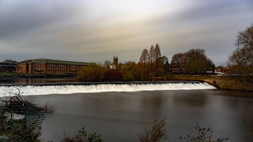A long exposure of the River Derwent in the centre of Derby, Derbyshire, UK