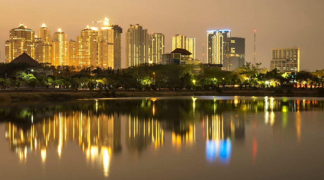 Golden hour city skyline with reflection of building after sunset in west Surabaya, Surabaya city, Indonesia