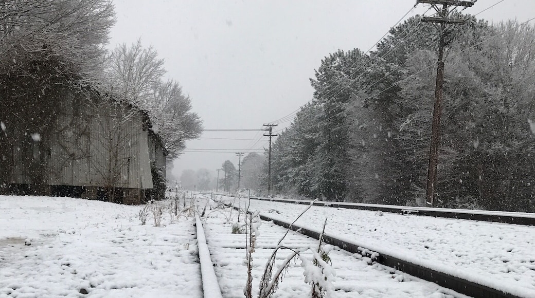 Peaceful afternoon, as a dusting of snow fell upon the tracks. Old Clemmons Station in the background.