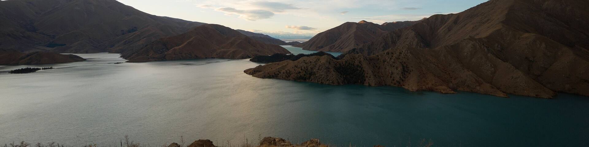 Panorama view of mountain lake nature landscape on Benmore Peninsula and Waitaki River in Canterbury New Zealand