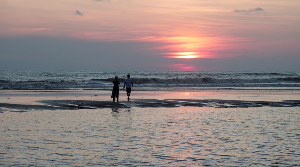 Couple on beach in sunset.this photo was taken from cox's bazar, Bangladesh.