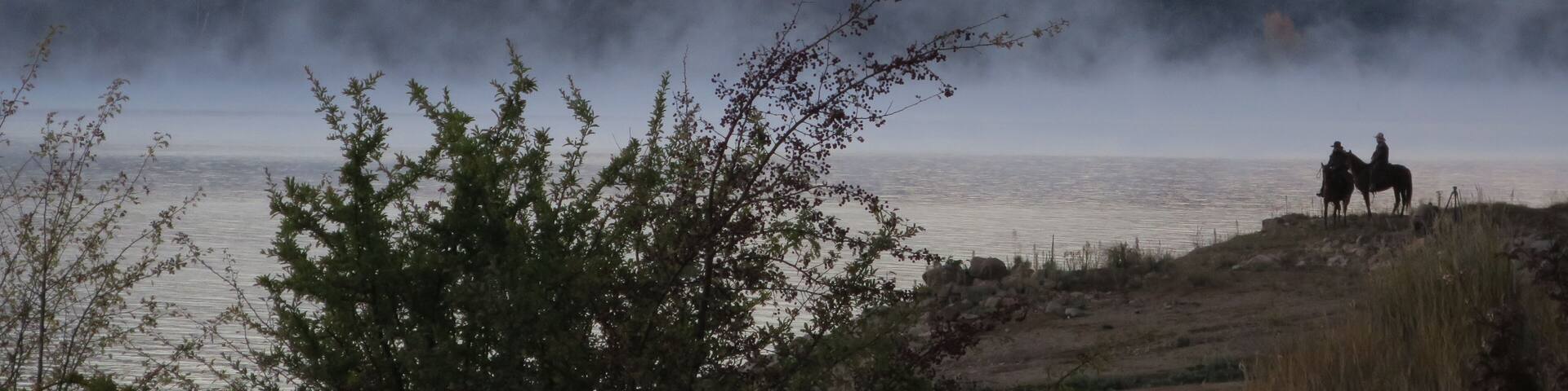 An early morning on ANZAC day, to riders pause before heading up to the community's dawn service, honouring the Australia and New Zealand Army Corps.