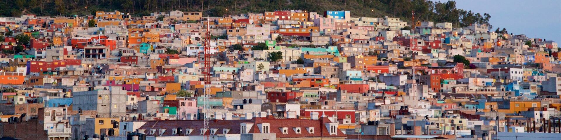 Pachuca mostrando um pôr do sol, paisagem e uma cidade