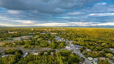 Queensbury, NY, USA - August 27, 2025: Late afternoon aerial view over the Queensbury / Glens Falls area near the southern boundary of the Adirondack Park of of Interstate 87.