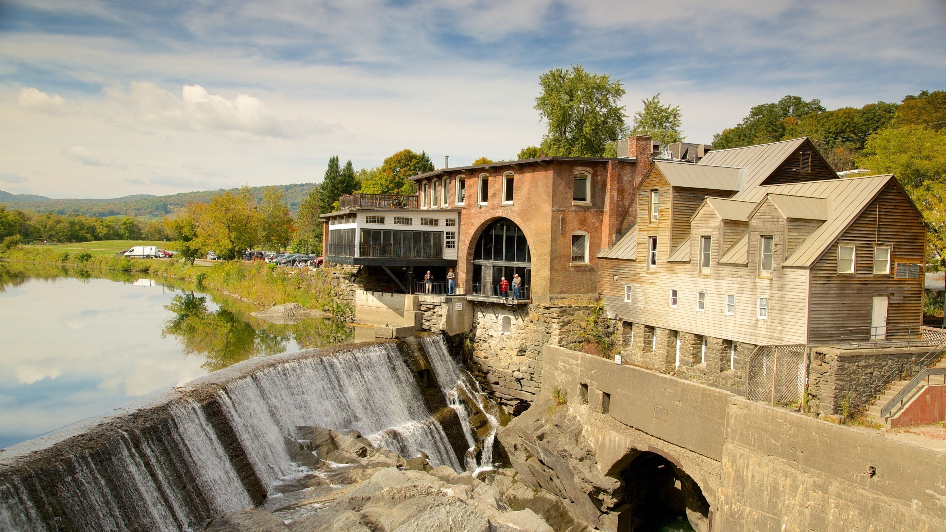 Quechee which includes a waterfall