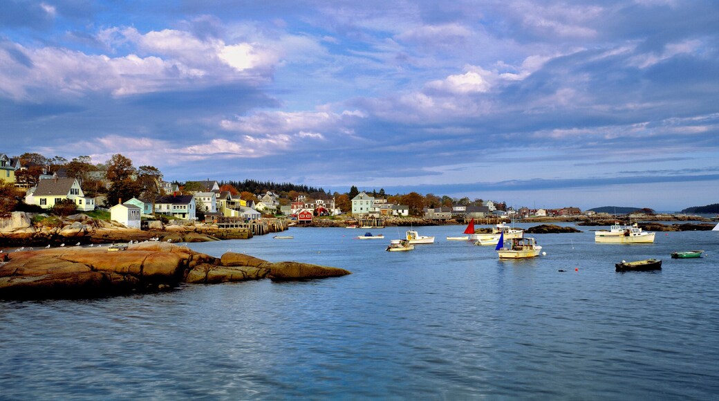 USA, Maine, Stonington. Blue-grey clouds sweep over the harbor of Stonington, Deer Island, Maine.
