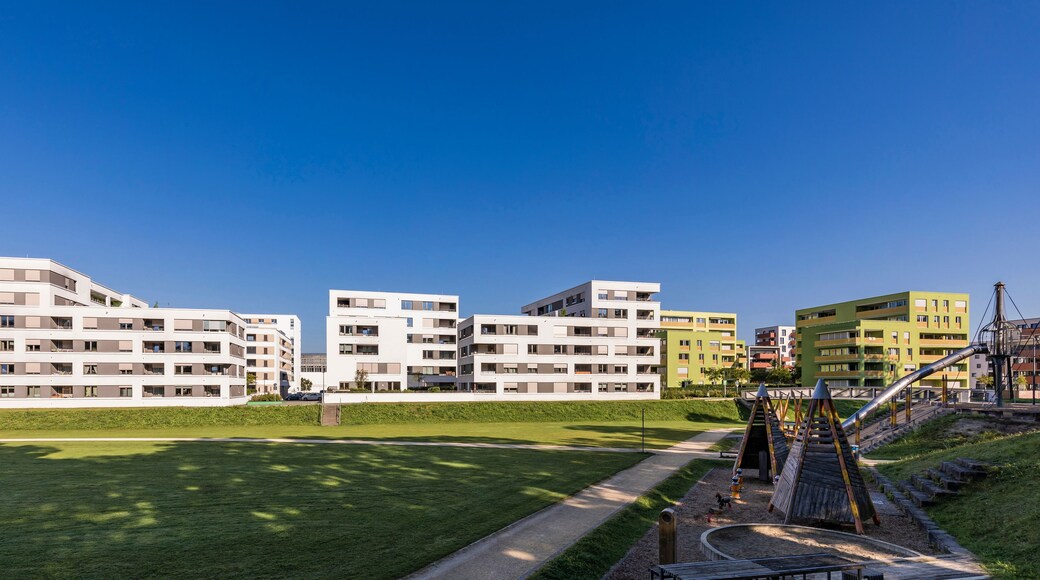 Germany, Baden-Wurttemberg, Ulm, Modern suburban apartments with public playground in foreground