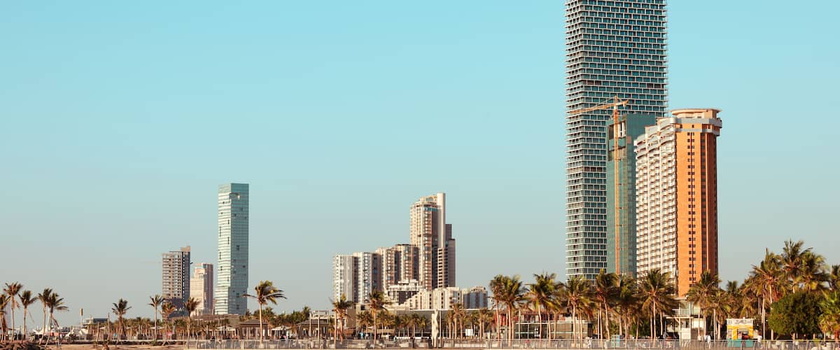 Modern skyscraper and luxury skyline on Jeddah waterfront corniche at sunset, Red Sea coast, Saudi Arabia