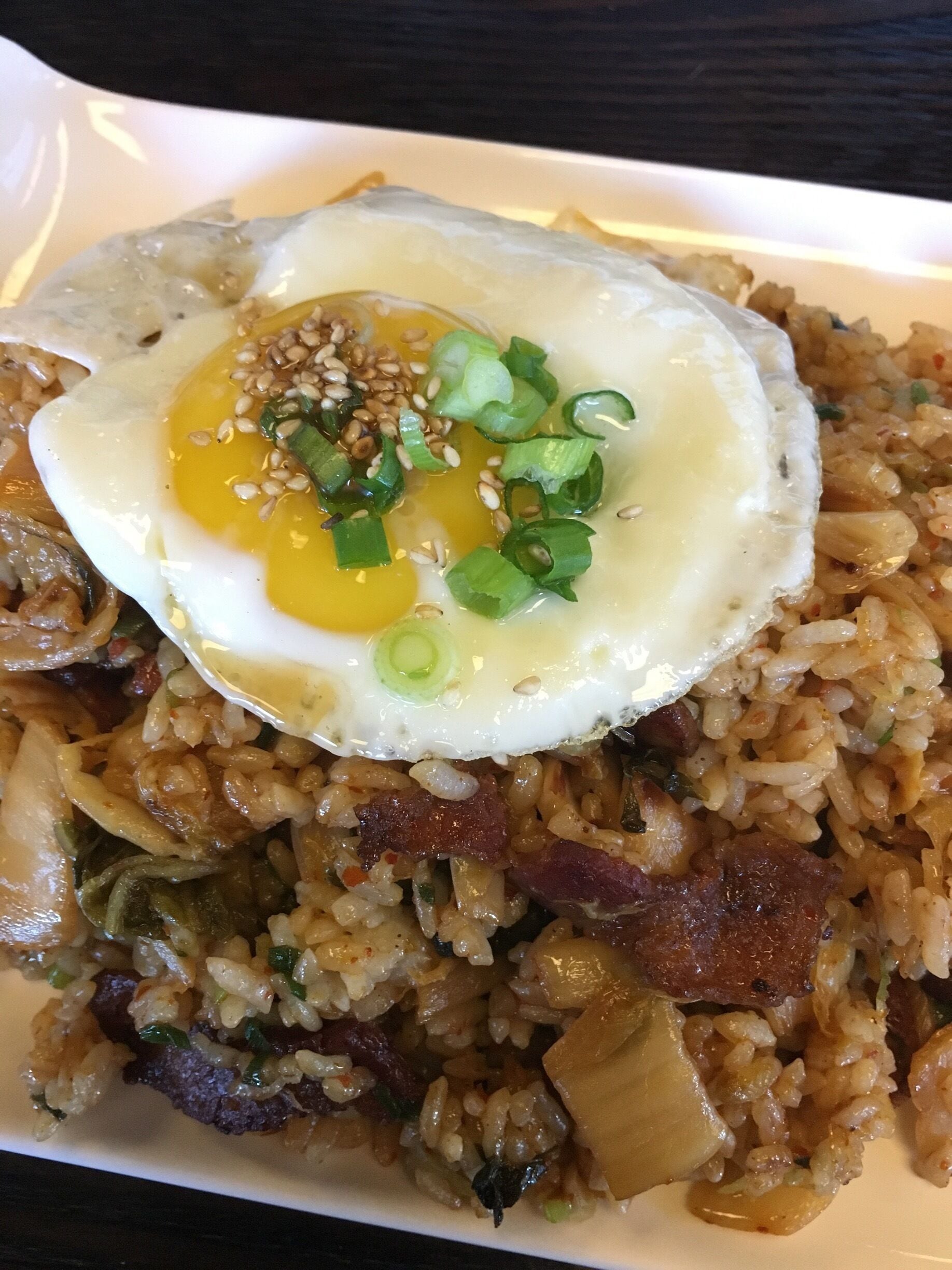 This place has mediocre reviews on Yelp, but the fried rice with kimchi and chicken wings were outstanding. 